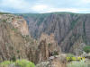 Two people near the Kneeling Camel, Black Canyon of the Gunnison Nat'l Park