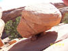 Large boulder, balanced on three little rocks, Arches Nat'l Park